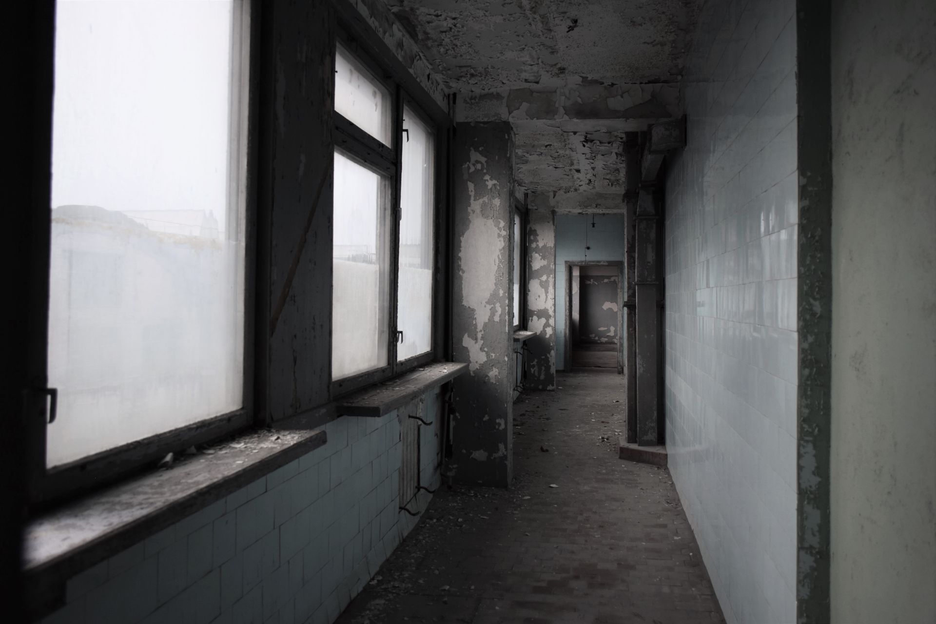 Empty hospital corridor in dim morning light