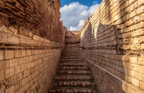 Free Historic stone tunnel with blue sky in Alexandria. Perfect for travel and architecture themes. Stock Photo