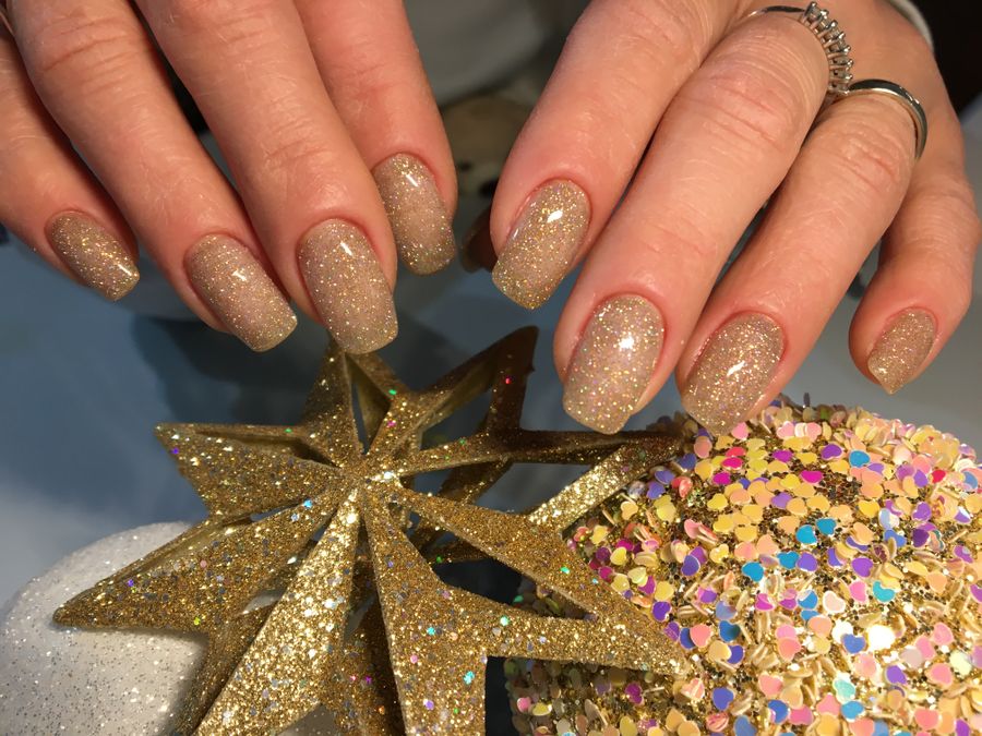 Gold-glitter nail set, holiday styling — Hush nail studio