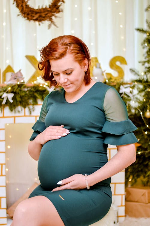 Pregnant Woman in Blue Dress