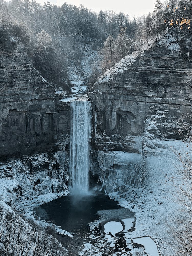 Waterfall In Winter Landscape