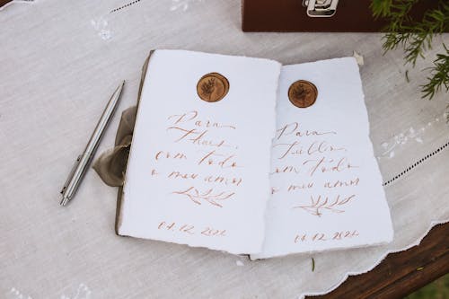 Handwritten Wedding Invitations on White Textile