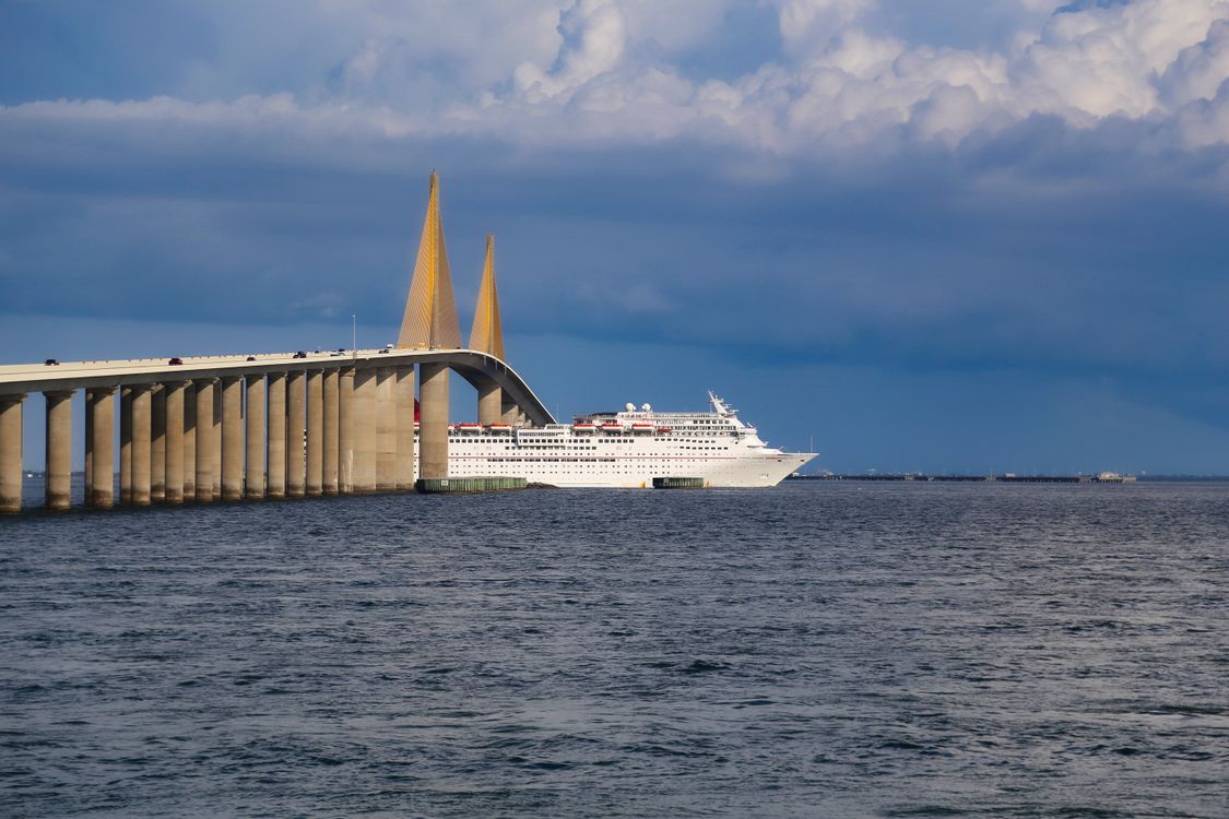 White Cruise Ship Sailing on the Sea Under Blue Sky · Free Stock Photo