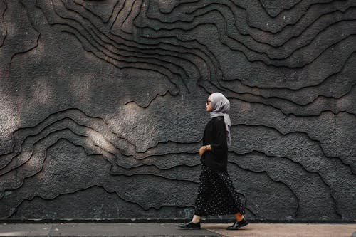 Woman Wearing Gray Hijab Walking