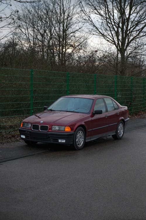 Red Car Parked on the Side of the Street