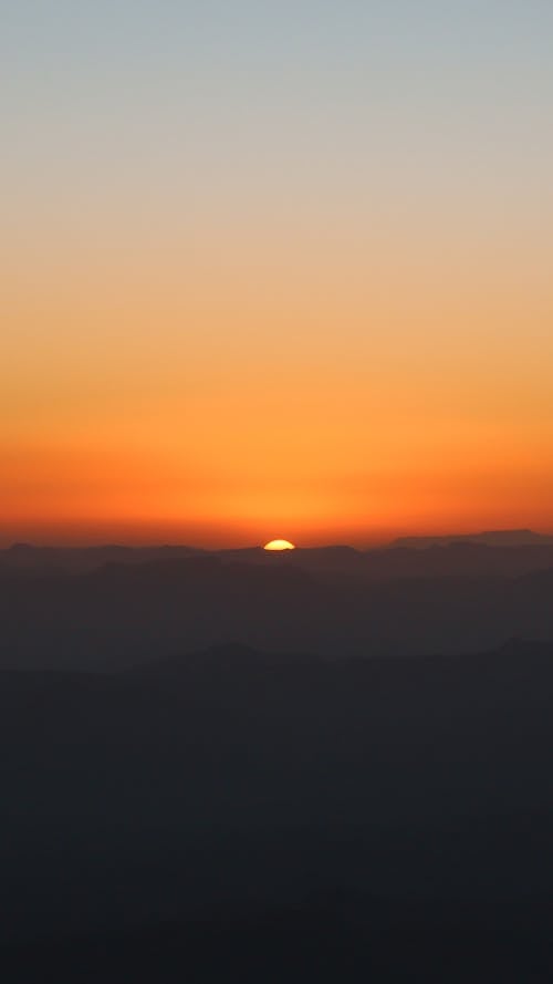 Silhouette of Mountains during Beautiful Sunset