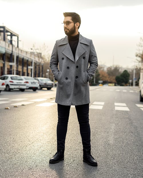 Man in Elegant Clothes Standing on Street 