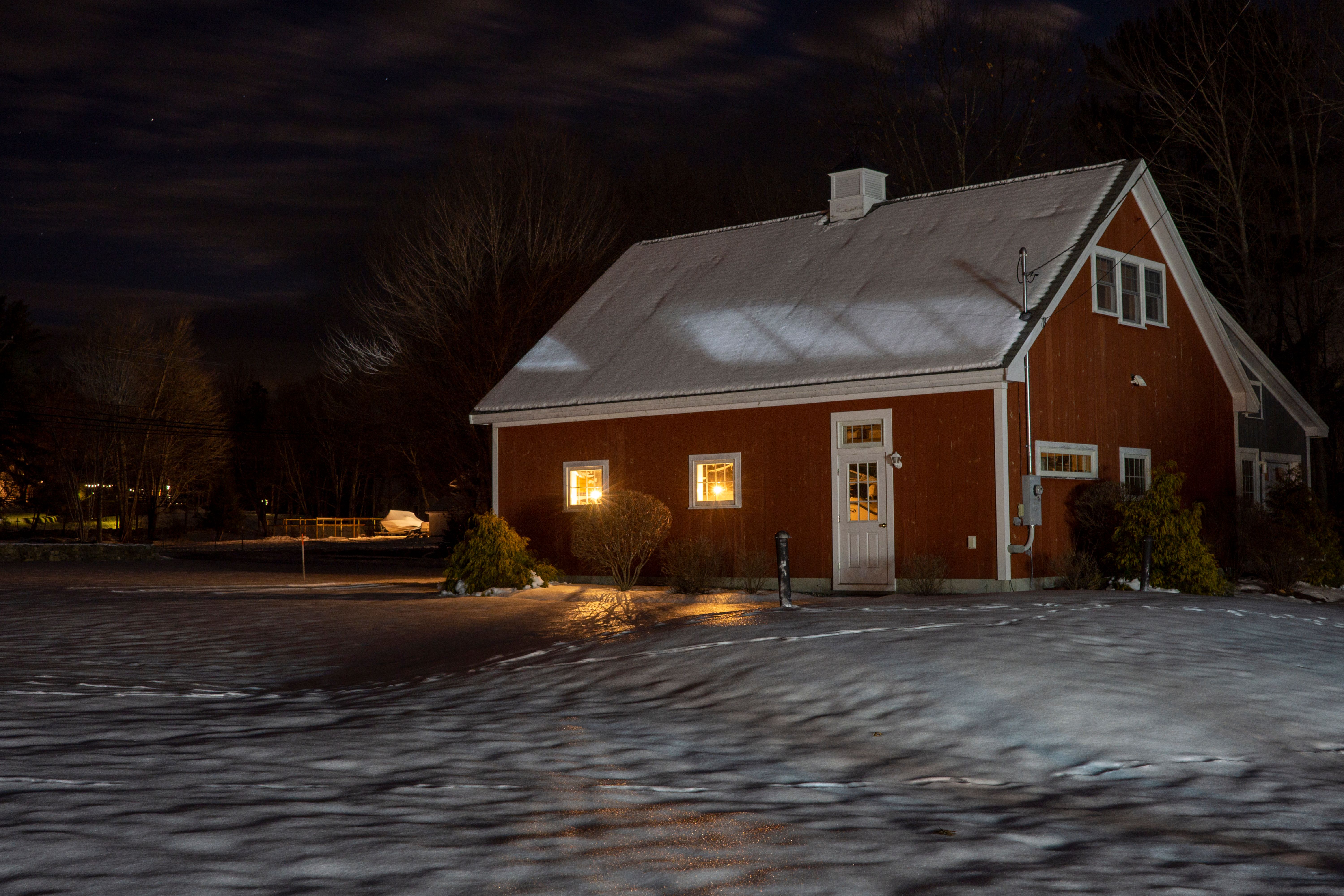 A Wooden House Covered in Snow · Free Stock Photo
