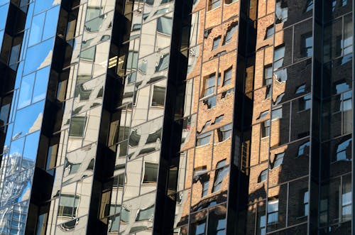 Foto profissional grátis de contemporâneo, edifício de vidro, exterior do edifício