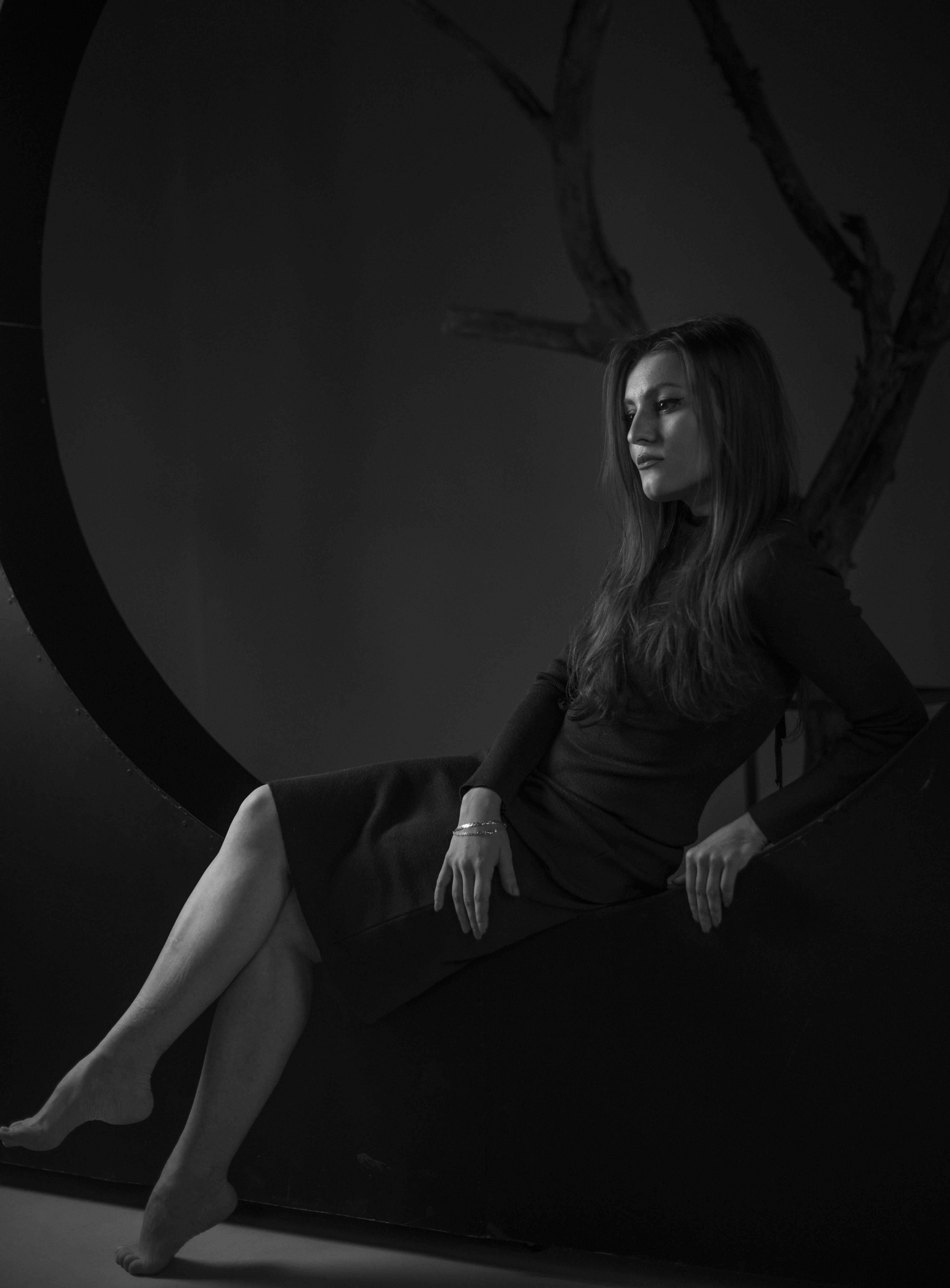 Grayscale Photo of a Woman in Black Dress · Free Stock Photo