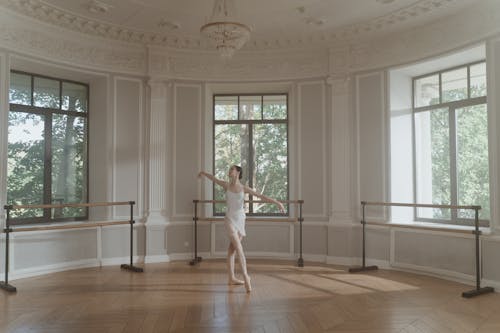 A Ballerina Dancing in the Studio