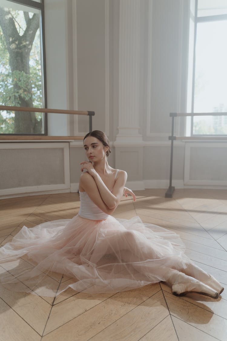 Woman Sitting On The Floor 