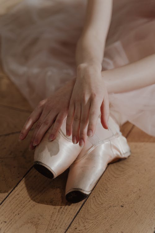 Person Wearing Ballerina Pointe Shoes 