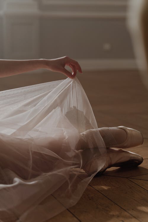 Ballerina Dancer holding a Sheer Fabric 