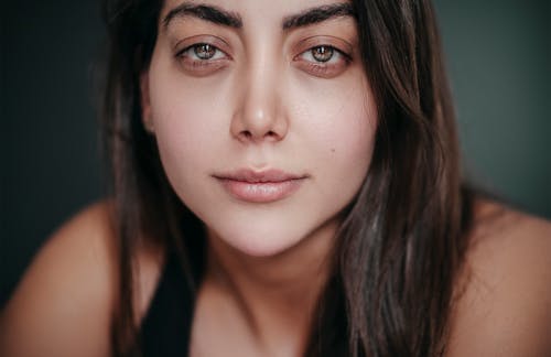 A Close-up Shot of a Woman's Face with Beautiful Eyes