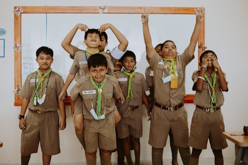 Portrait of Scout Boys in Classroom