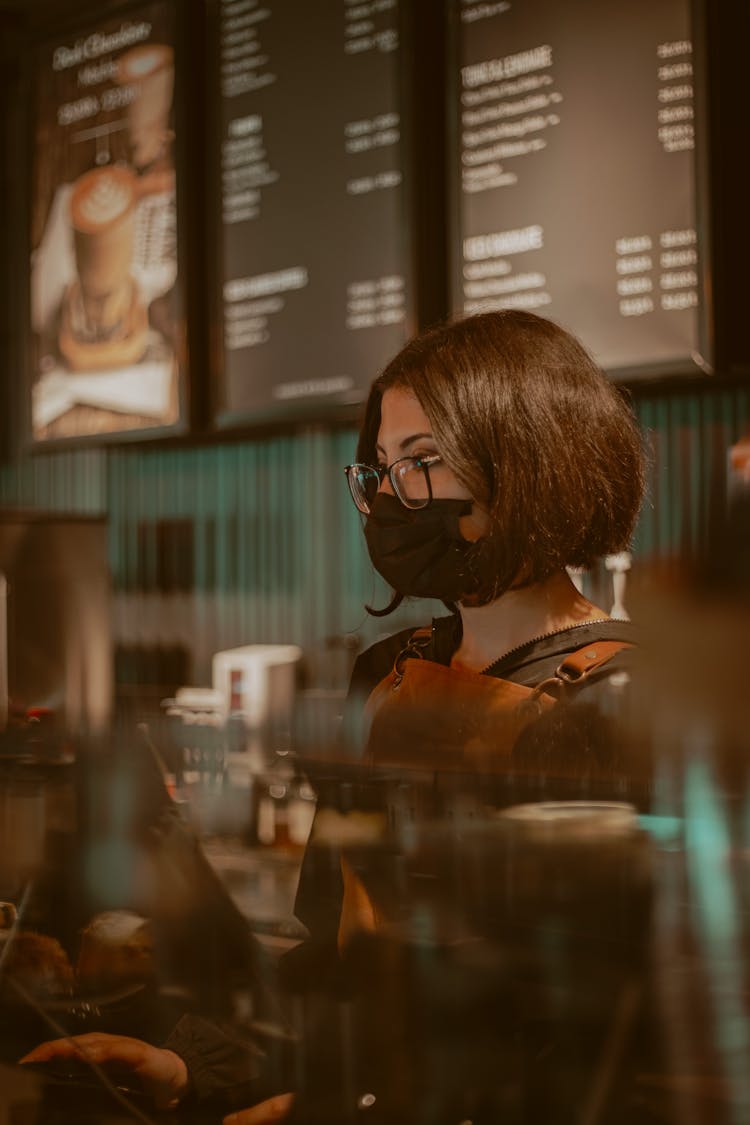 A Barista Wearing A Face Mask