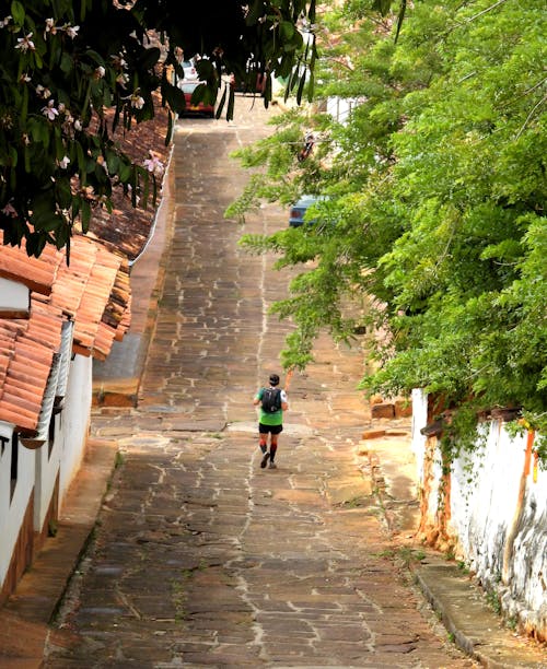 Free stock photo of cobblestone street, runner, sportsman