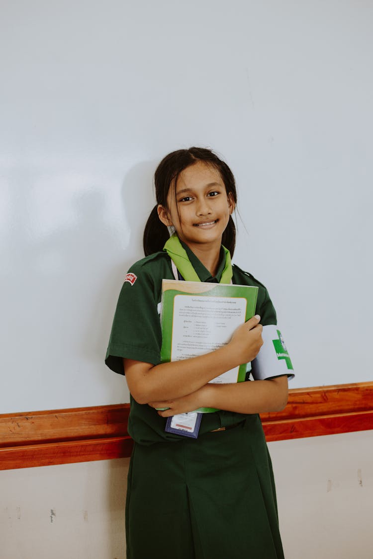 Girl Scout Student In Green Uniform