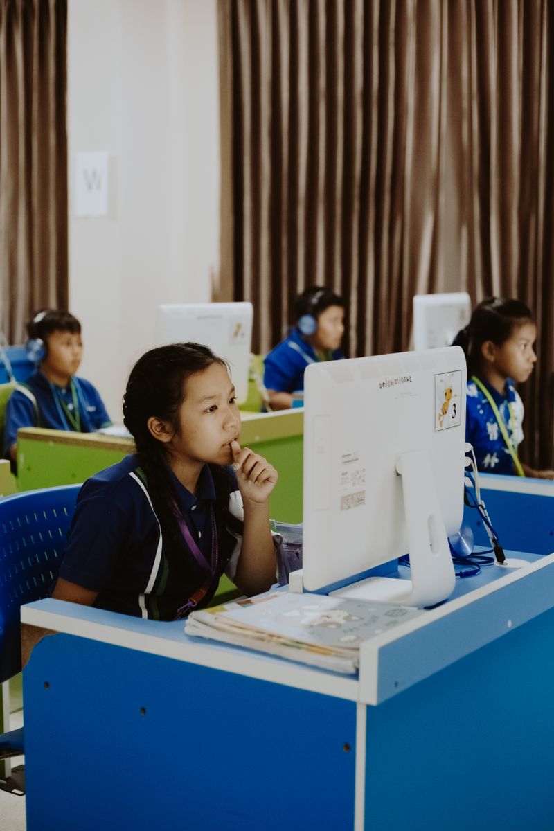 Students preparing for the computer-based PTE Academic test