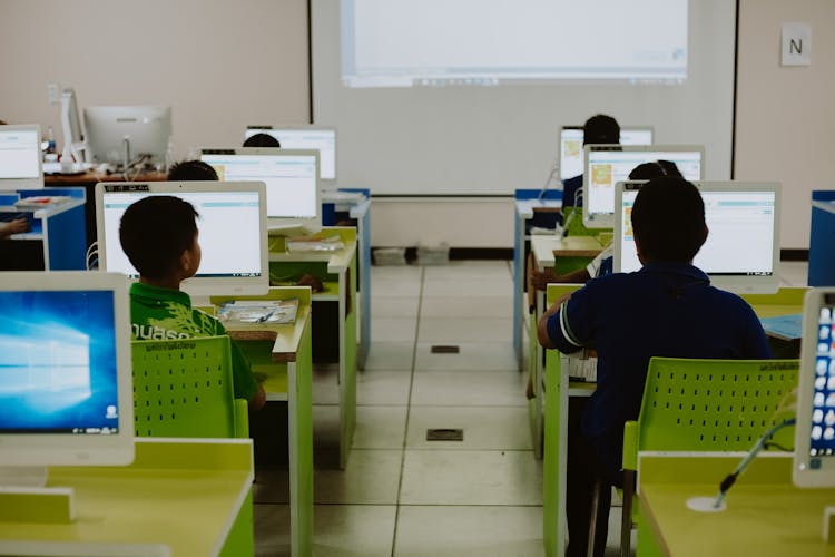 Students Sitting In The Classroom