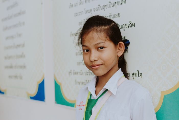 A schoolgirl smiling