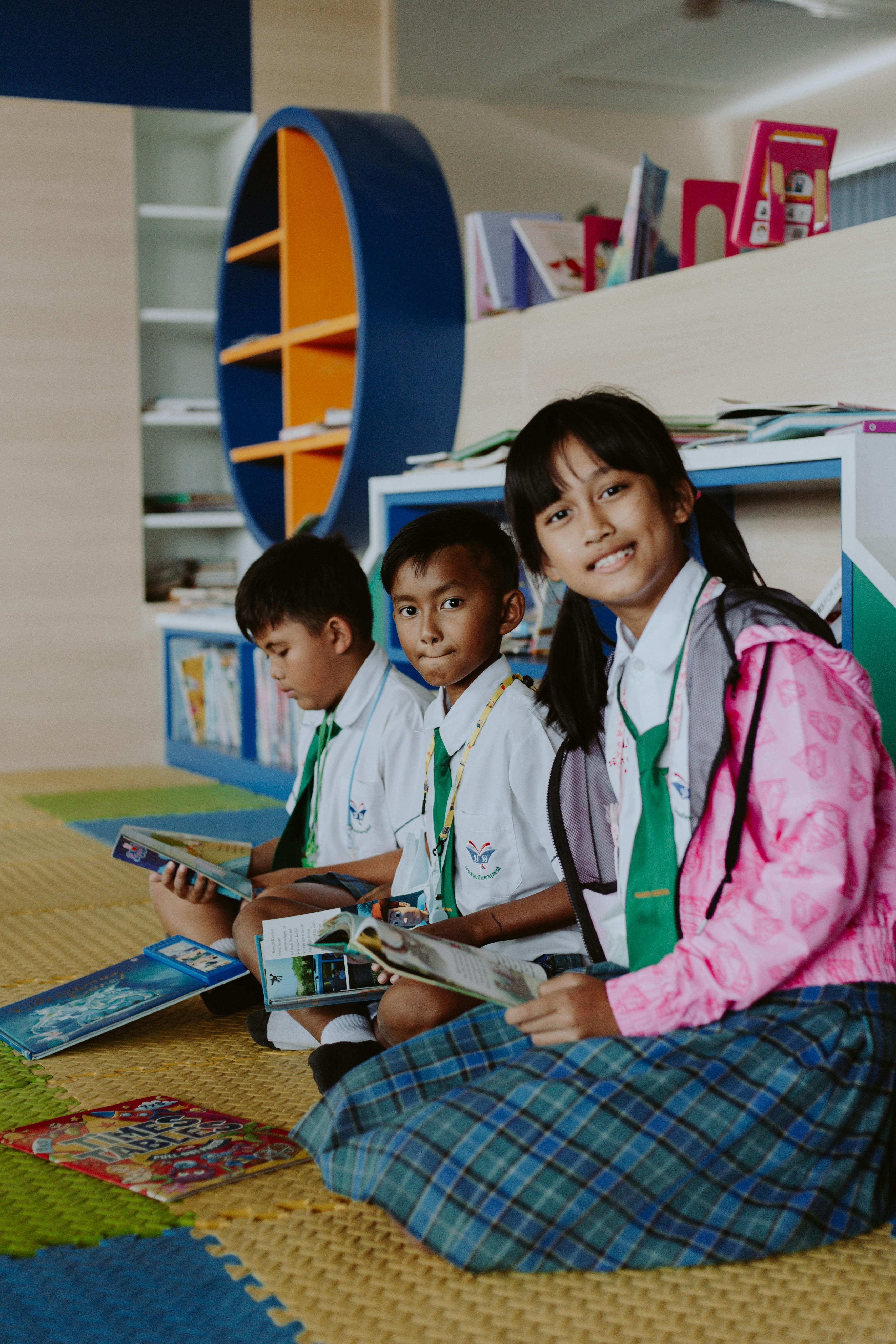 group of students reading a book