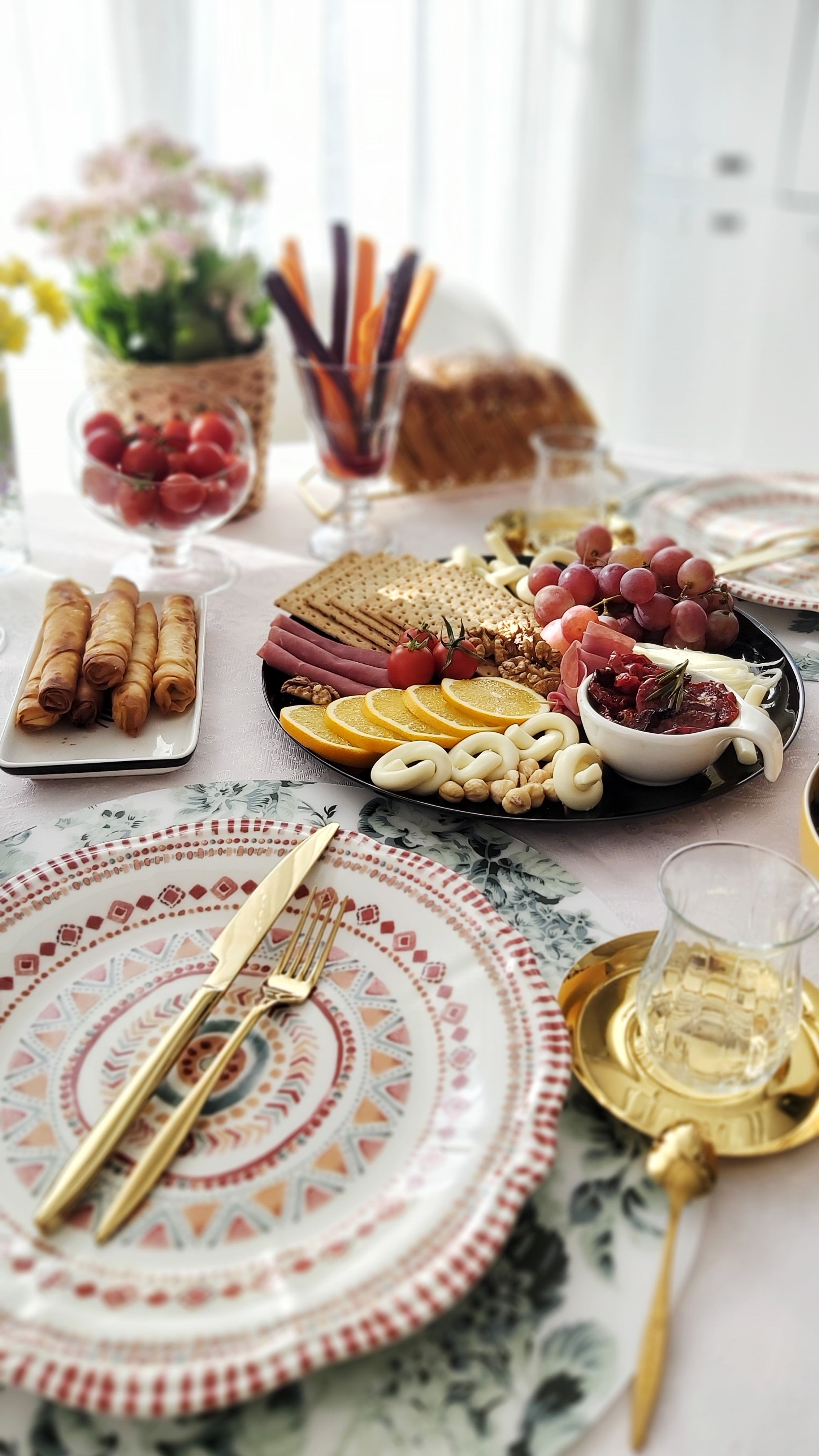 Beautifully arranged breakfast table with fruits, pastries, and elegant cutlery. Perfect for a luxurious morning setup.