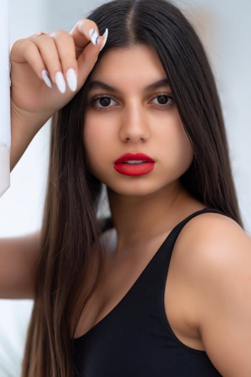 Close-Up Shot of an Attractive Woman in Black Tank Top