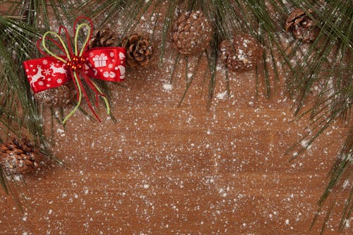 Close-Up Shot of Pine Cones on a Wooden Surface