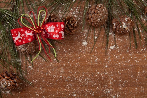 Close-Up Shot of Pine Cones on a Wooden Surface