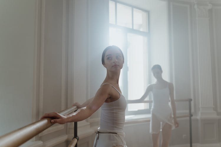 Female Ballerinas On A Practice Room 