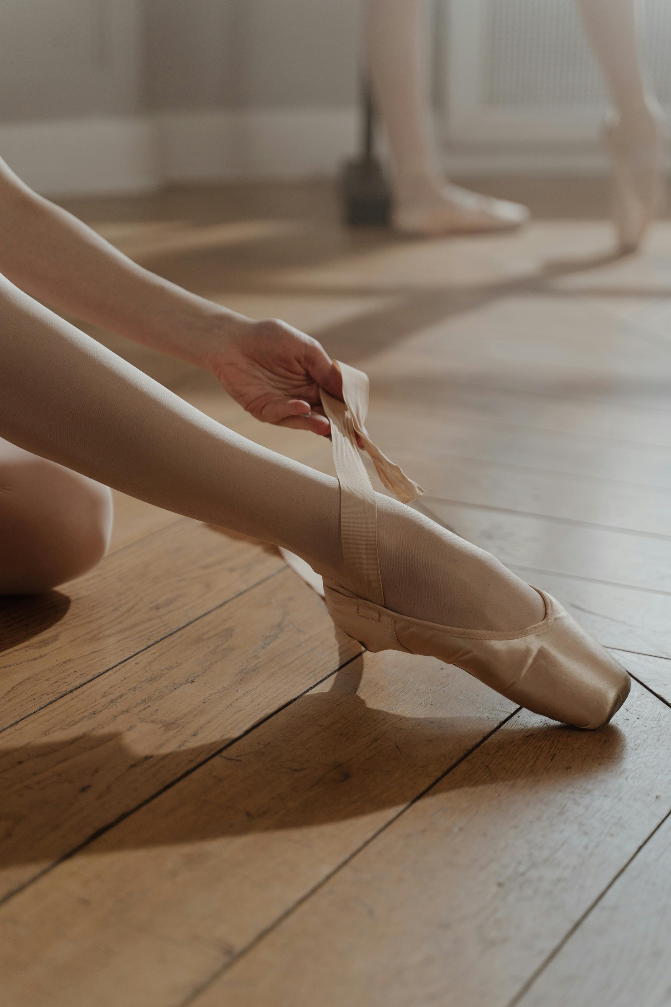 a person wearing a pointe shoes