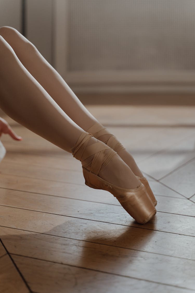 Person Wearing A Pointe Shoes 