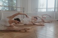 Women in White Dress Dancing Ballet