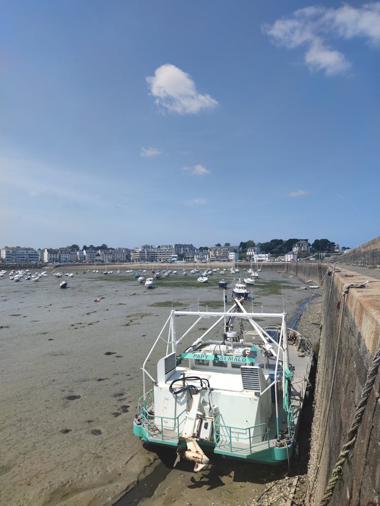 Boats In Shallow Bay