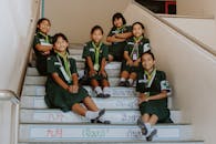 A Group of Students Sitting on the Stairs