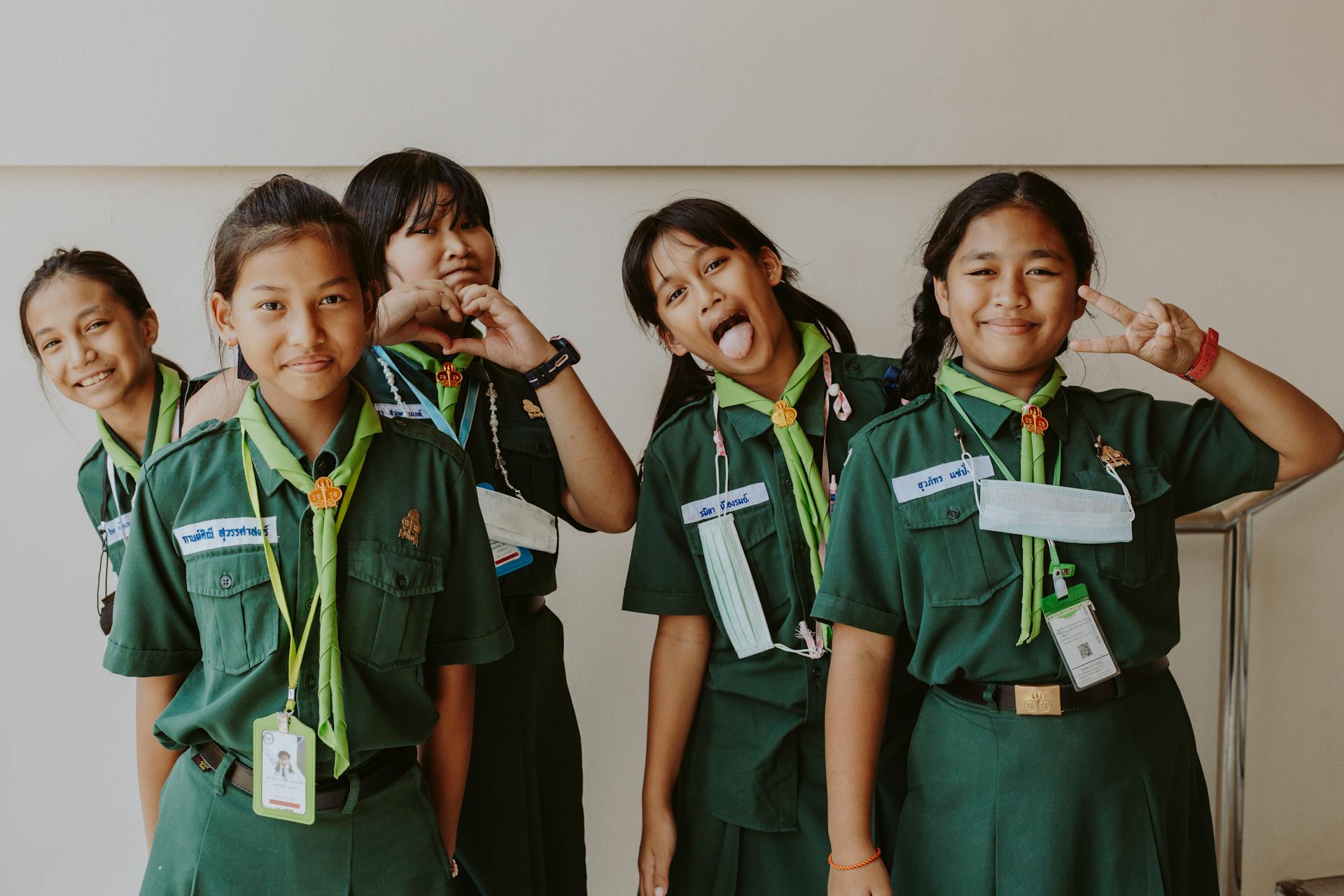 Young Girls in their Green Girl Scout Uniform