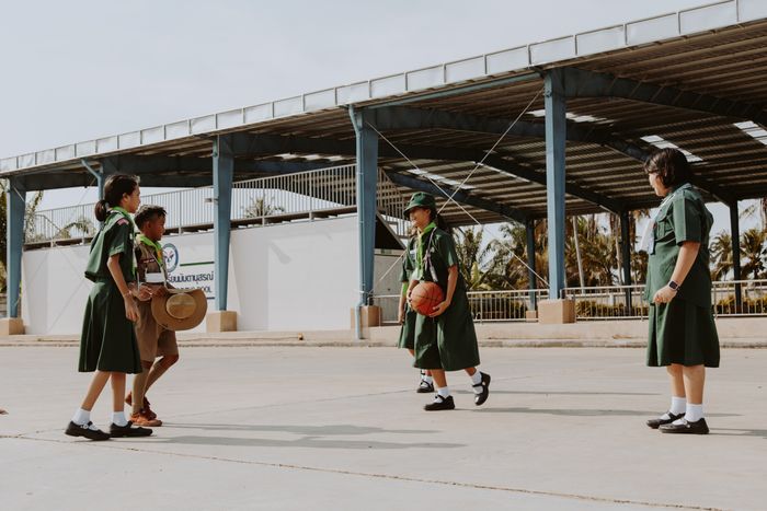 Students playing basketball