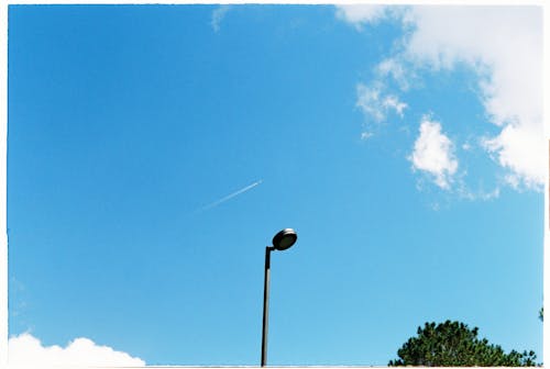 Black Street Light Under Blue Sky