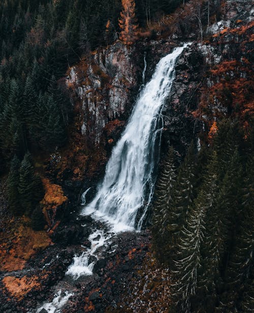 Free Waterfall in Mountain Landscape Stock Photo