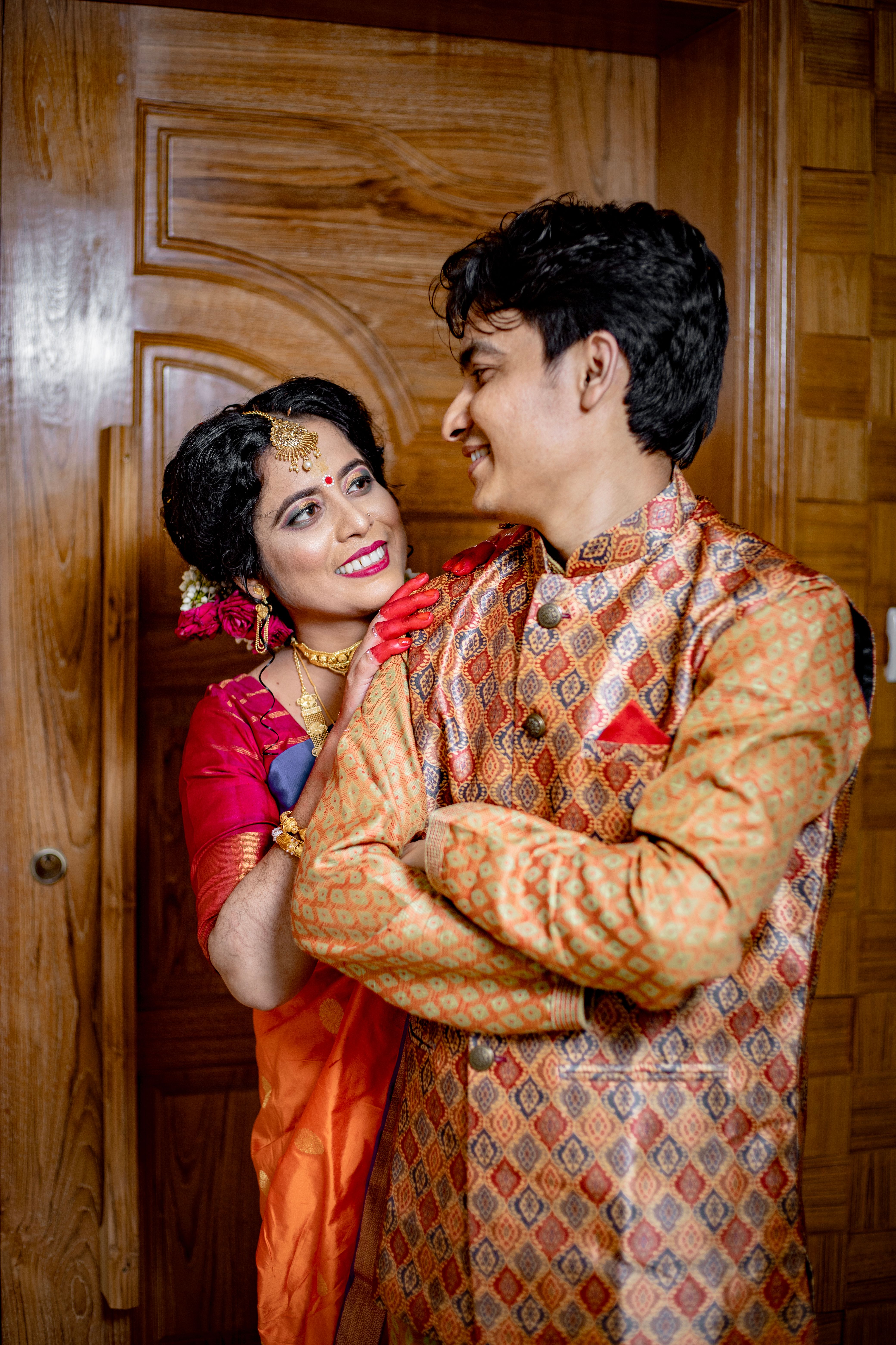 A Couple in Traditional Clothes Looking at Each Other · Free Stock Photo