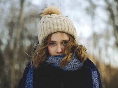 A Young Girl Wearing Brown Winter Beanie