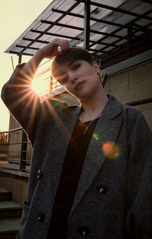 A Woman in Black Coat Posing