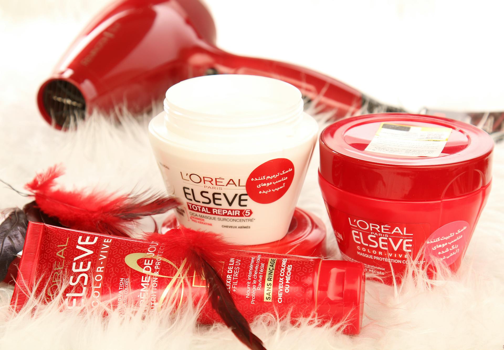 Loreal Products Beside the Red Hair Dryer