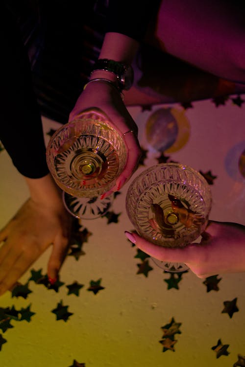 Two Women Doing Celebratory Toast