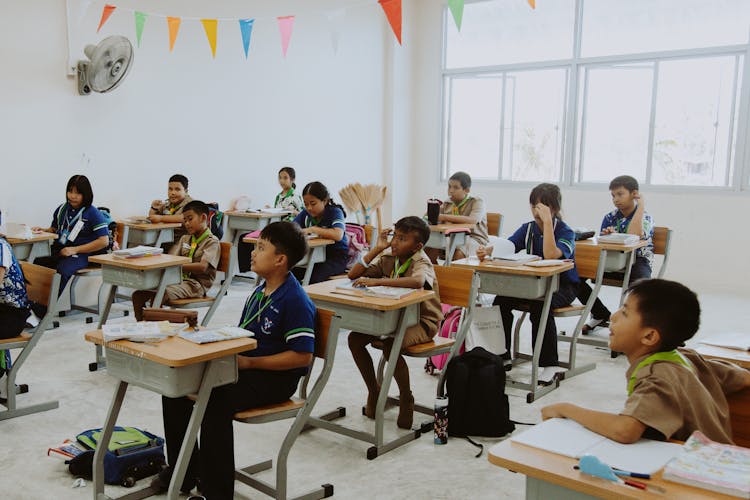 Children Sitting In The Classroom