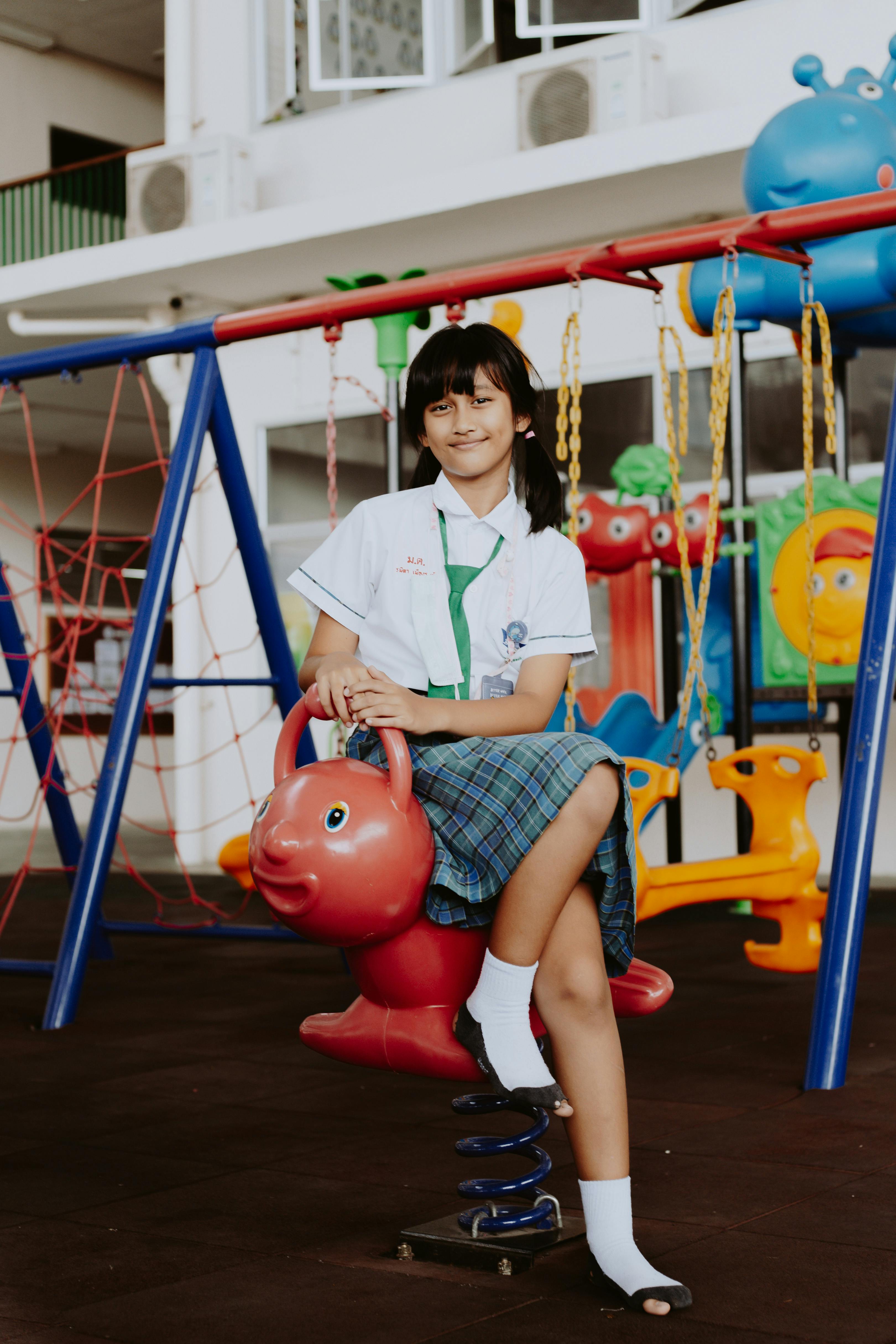 portrait of smiling girl in school uniform