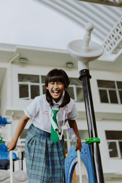 Girl Playing at a Playground