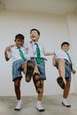 Playful Boys in School Uniforms
